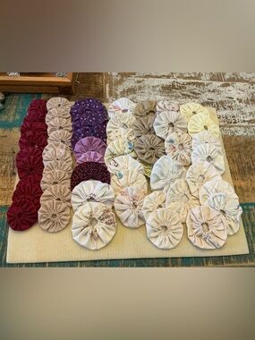 Handmade vintage Fabric Yo-Yo Quilt Pieces, total of 50!